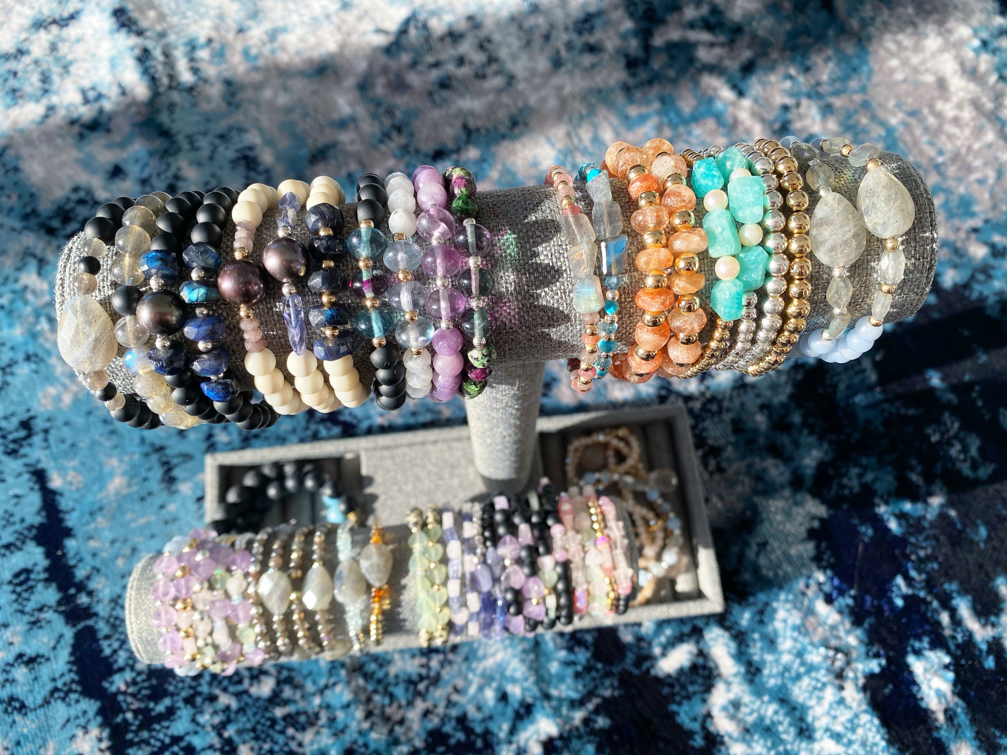 Flax and Fancy gemstone bracelets shinning in the sun